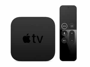 a black square box with buttons and a remote control