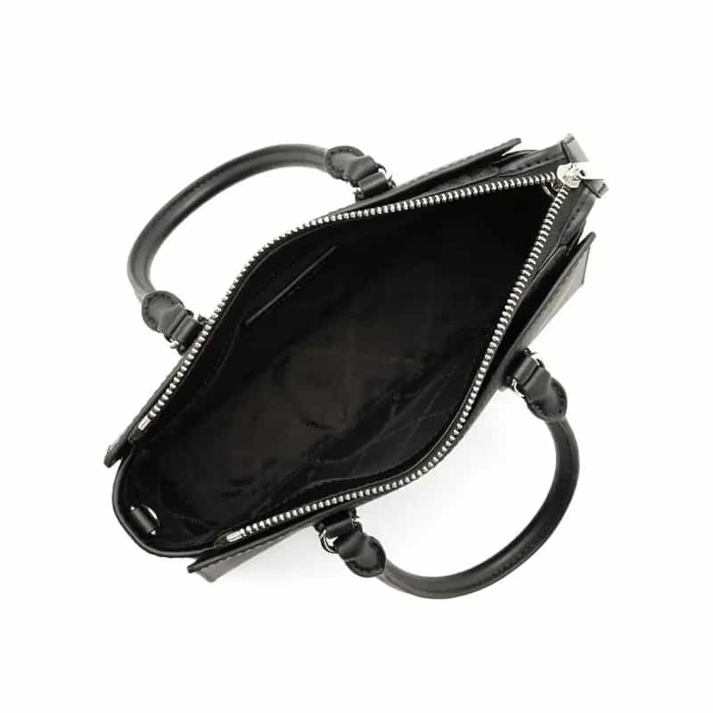 Intérieur du sac Michael Kors Arden – compartiment zippé avec poche intérieure, doublure noire