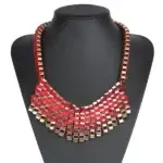 a necklace on a mannequin