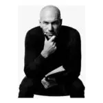 a man holding a pen and a book