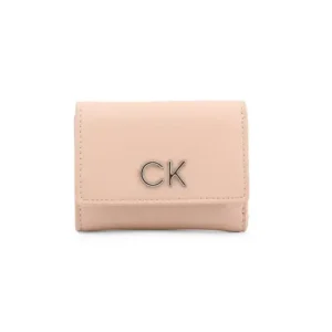 a pink wallet with a silver logo